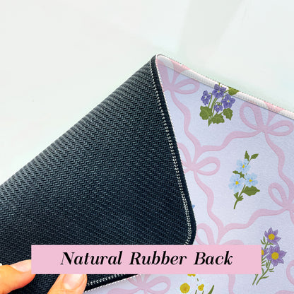 Wildflower desk mat with a non-slip rubber backing to help keep the mat securely in place during daily use.