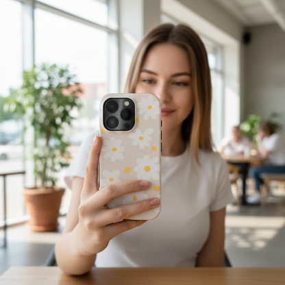 Woman holding a phone with a floral case shwoing it in everyday use