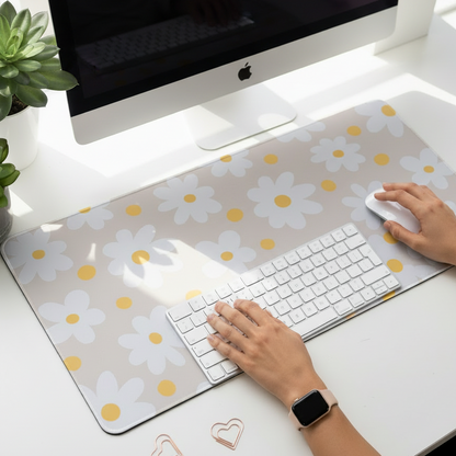 Large floral desk mat with daisy flowers on a beige background doubles as a mousepad