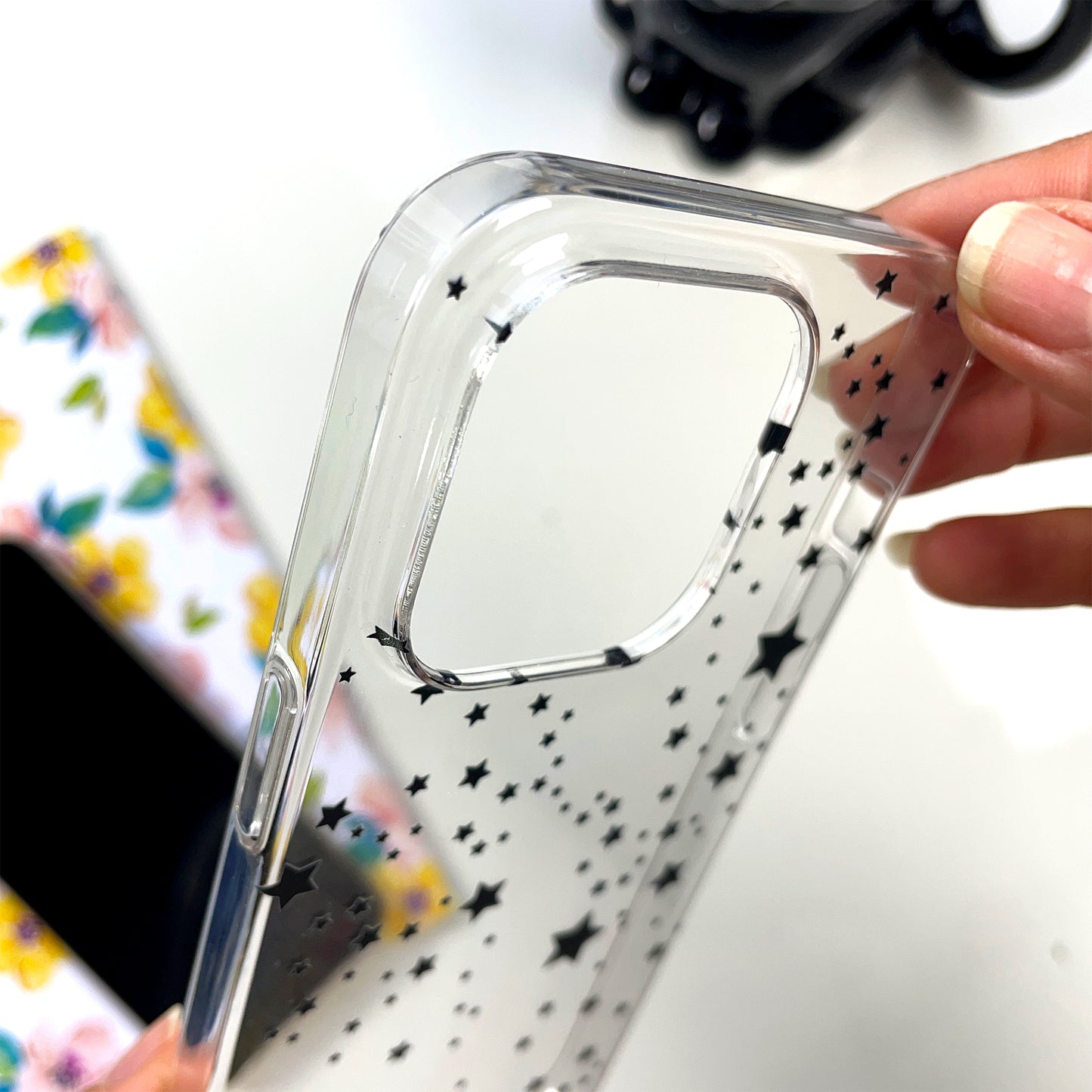 Black stars phone case showing details like raised camera and 360 protection