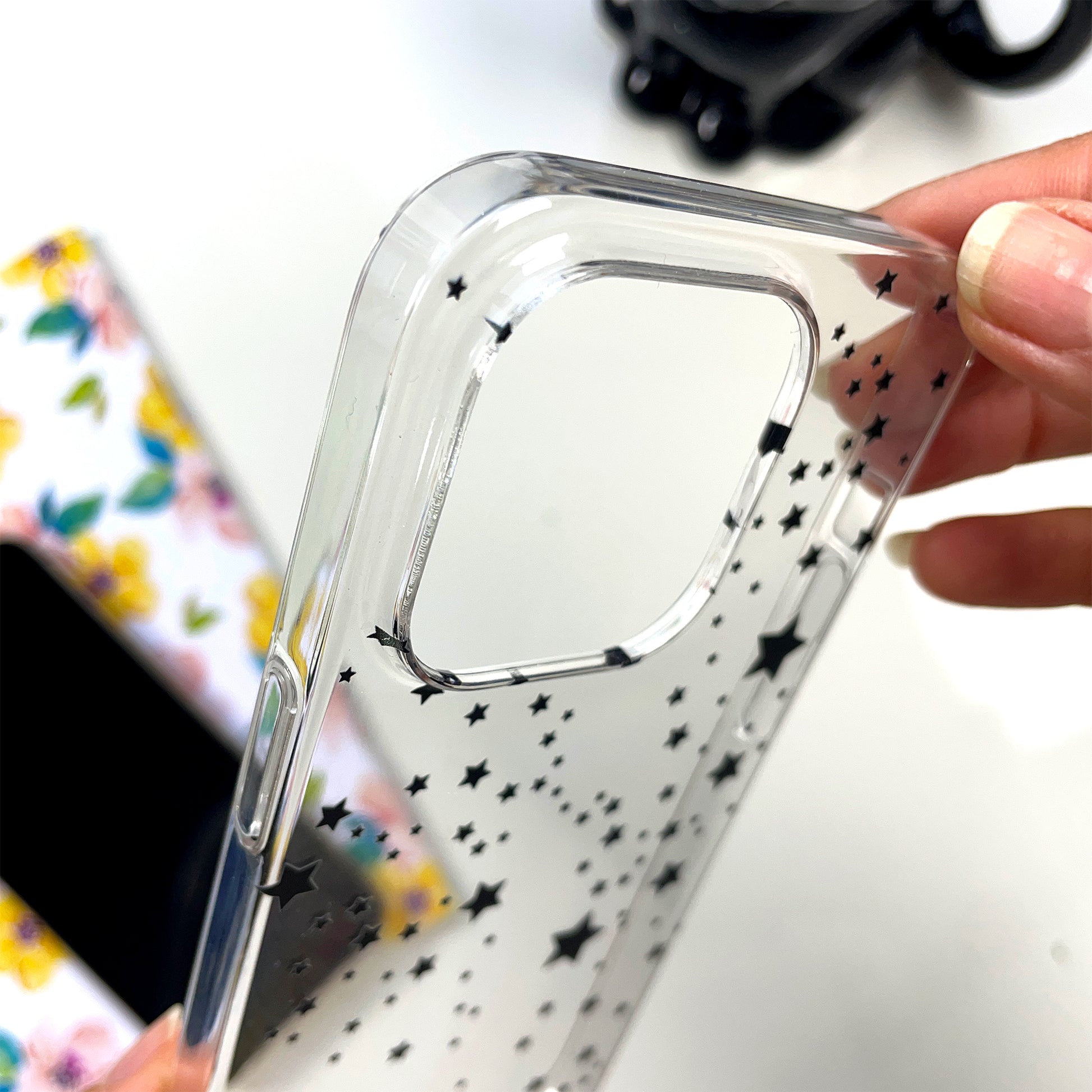 Black stars phone case showing details like raised camera and 360 protection