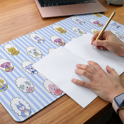 Blue Pups desk mat on a desk being used