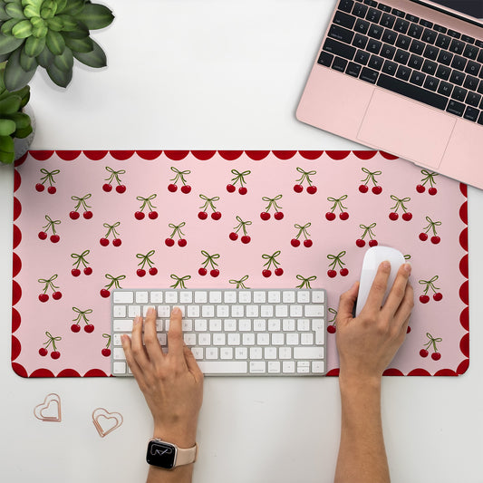 Cute Cherry desk mat with soft pink background and red edge, perfect for work from home desk setup