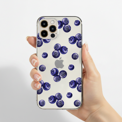 woman holding the clear blueberry phone case