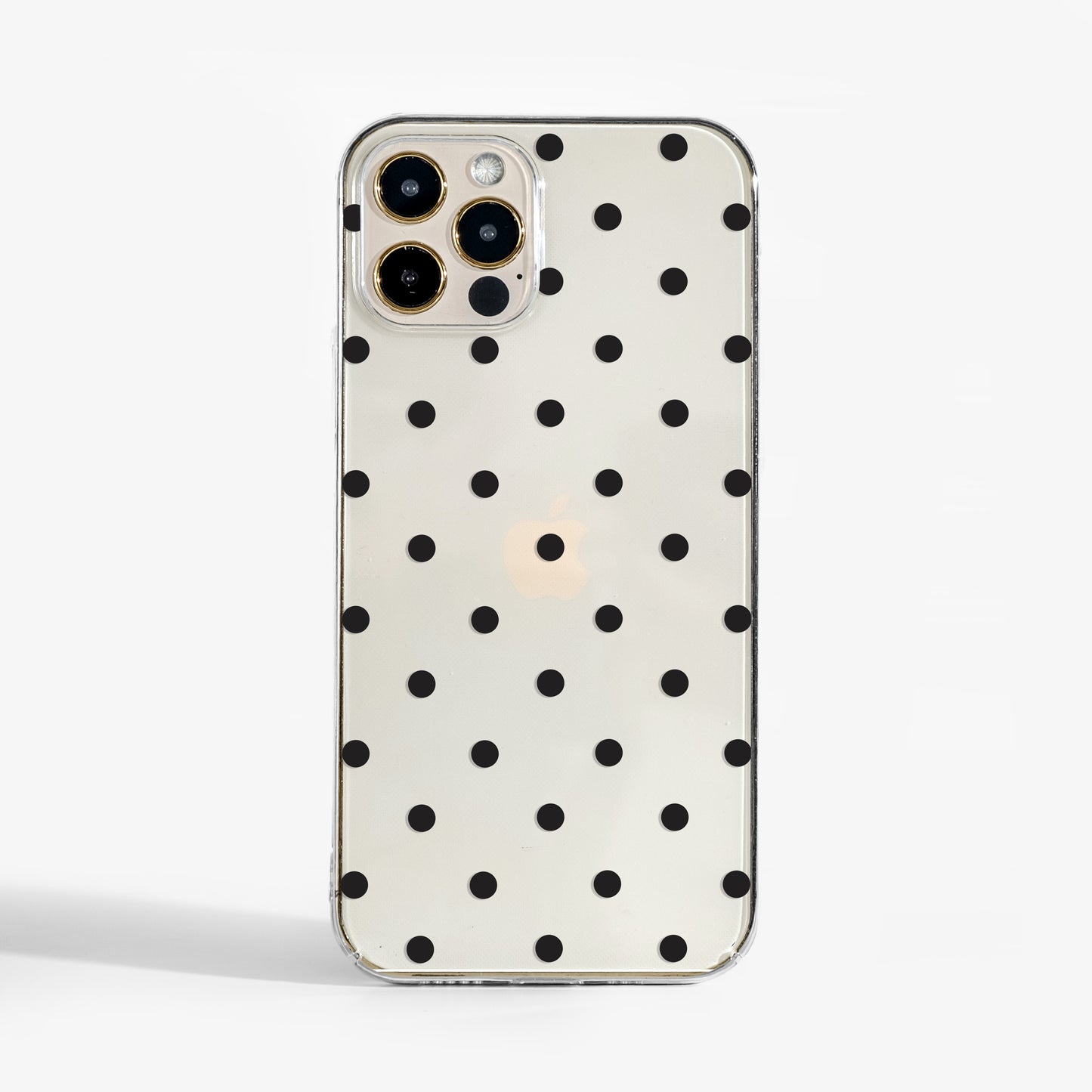 Clear polka dots phone case with minimal monochrome dot pattern on transparent background