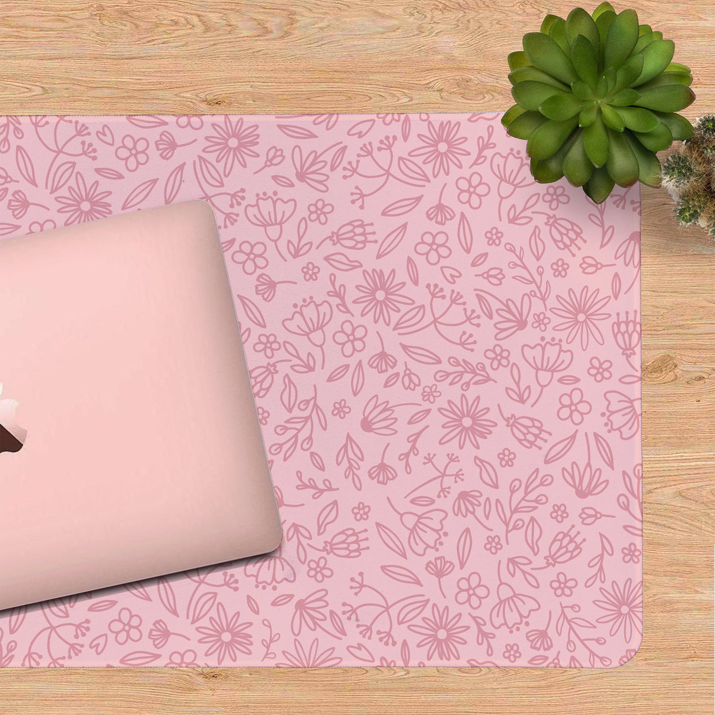 Pink floral desk mat with a laptop for a cosy and aesthetic desk setup