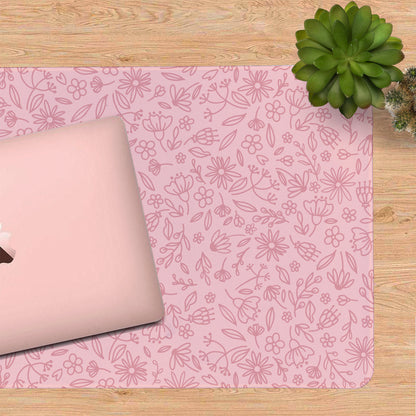 Pink floral desk mat with a laptop for a cosy and aesthetic desk setup