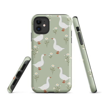 iPhone 15 Geese Tough Case with glossy wrap around print, featuring geese on  a green background and dual- layer protection — a bold, art-inspired design that keeps your phone safe in style.