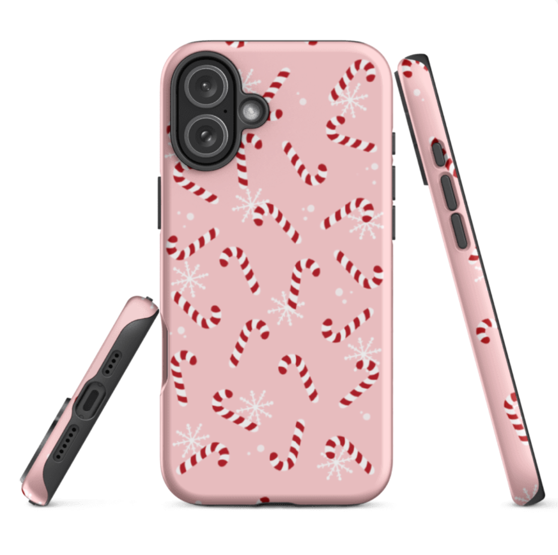 iPhone 17 Phone case with candy cane and snowflake pattern on a pink background for a festive style and protection- with printed sides and glossy finish 