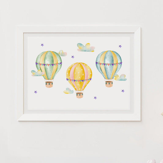 Framed artwork of colorful hot air balloons on a white wall