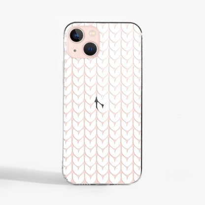 Clear knitted pattern phone case with cozy winter print design on a light pink iPhone.