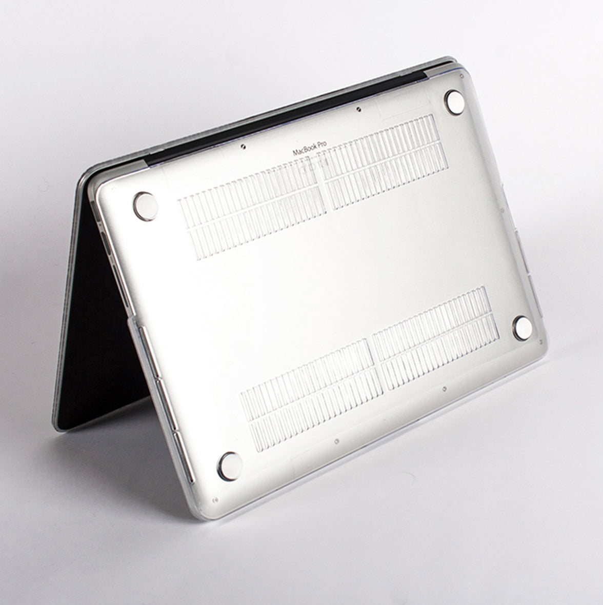 Painted Dots MacBook Case showing Clear bottom part with rubbersized legs for extra satbility. 