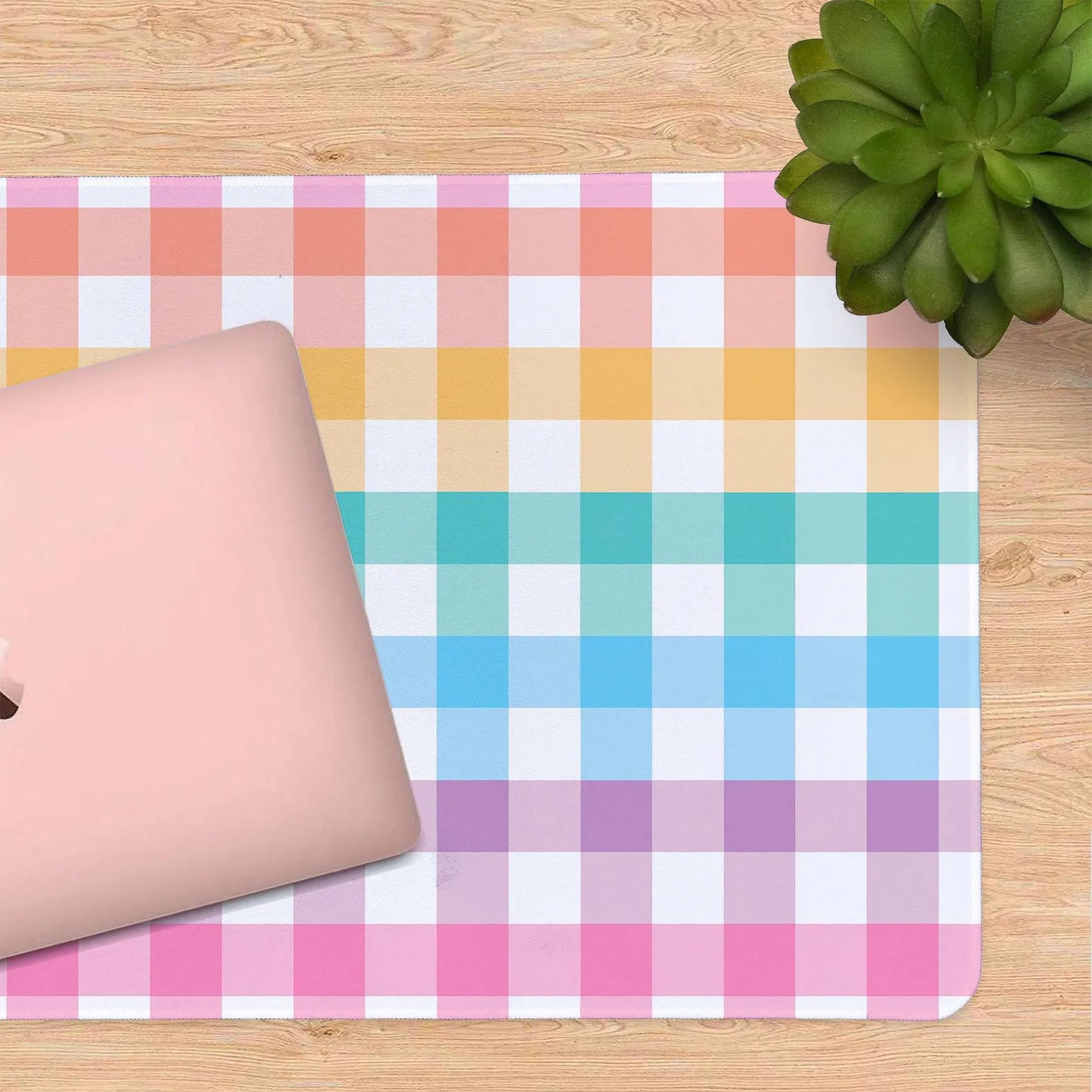 Close up shot of the rainbow plaid desk mat
