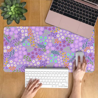 Small Purple Flowers Desk Mat featuring a smooth fabric surface and non-slip base for comfort and style.