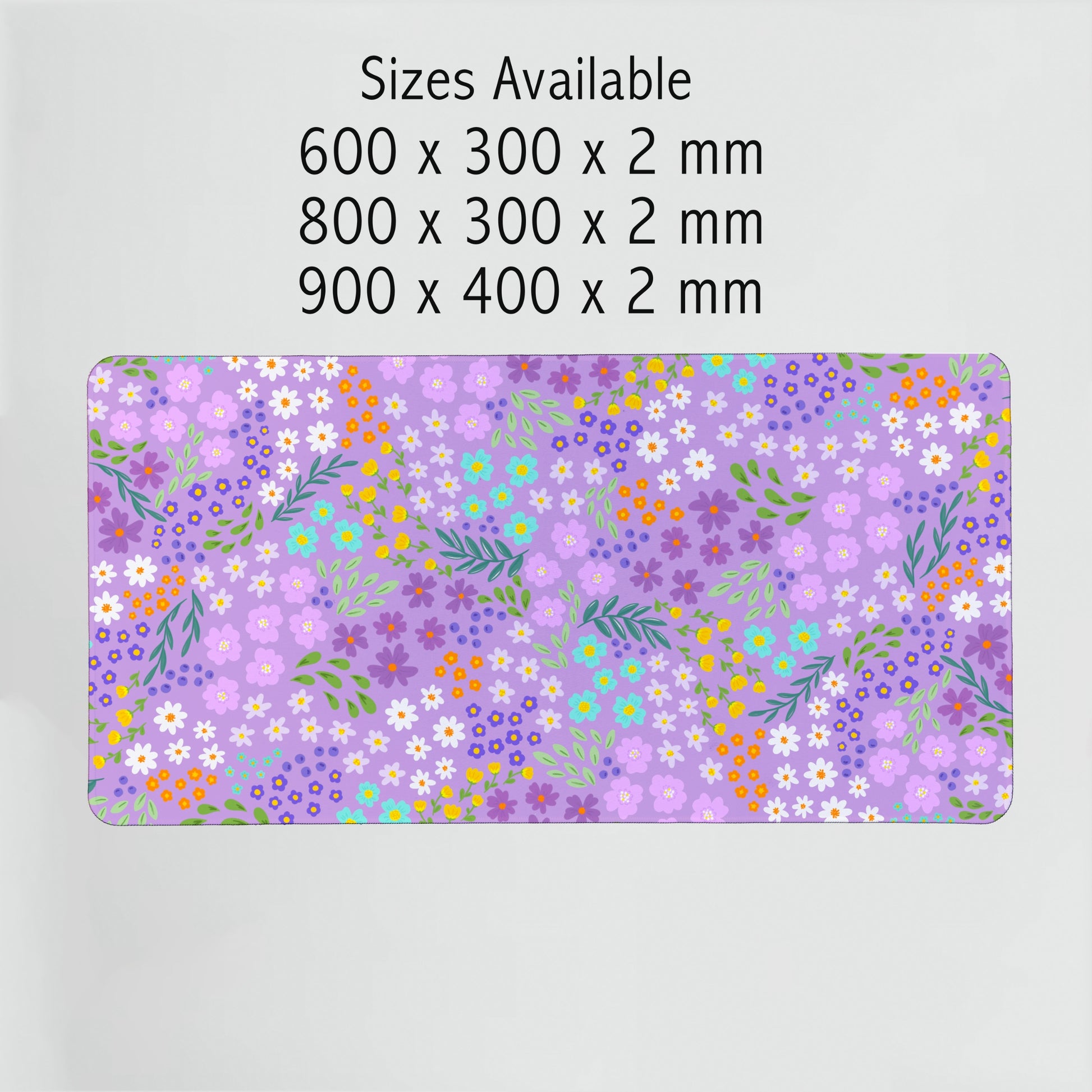  Small Purple Flowers Desk Mat shown in all available sizes — pretty, practical, and made to fit any desk setup