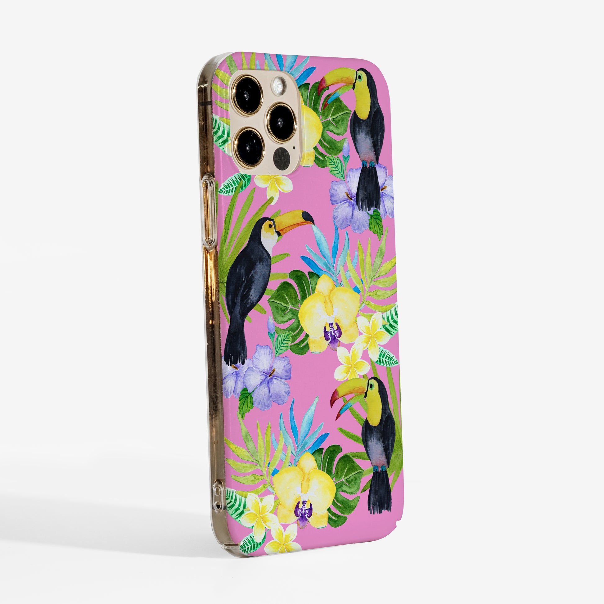 Phone case with toucan and floral design on a pink background showing clear sides of the cover