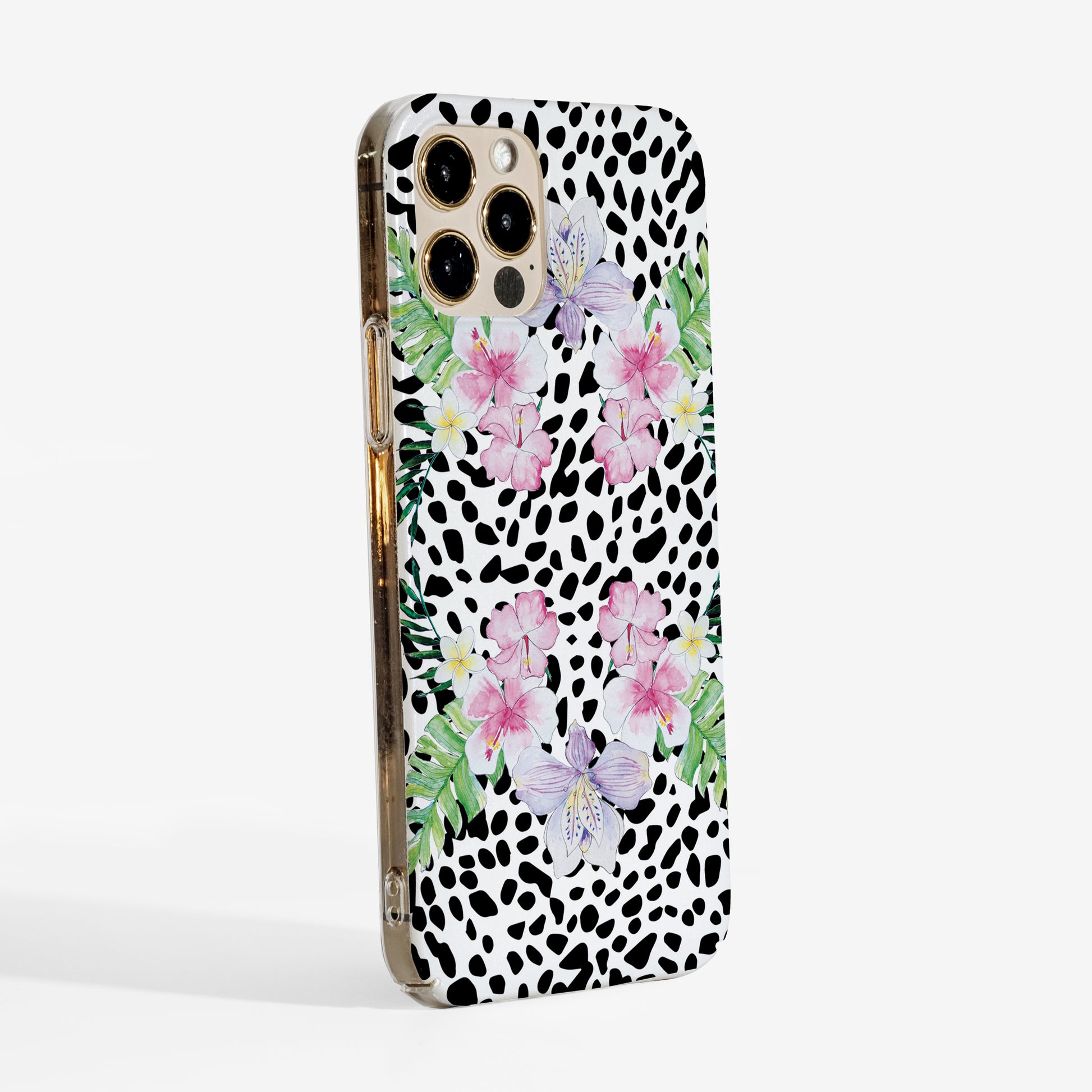 Side view of Tropical Paradise Phone case featuring black and white spotted pattern and pink flowers on a white background and clear sides for a modern look