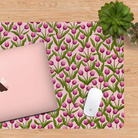 Pretty floral desk mat featuring ulips on a soft pink background. 