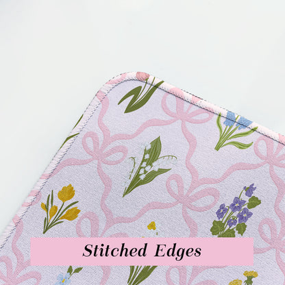 Fabric with floral pattern and stitched edges